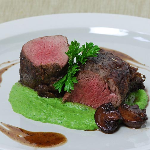 Wild Boar Medallions With Green Pea Pesto Recipe | Steaks and Game Photo [1]